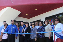 Ms. Amanda Aguirre, President and CEO of RCBH, along with staff and Board members cut the ribbon during ceremony on July 11th, 2016