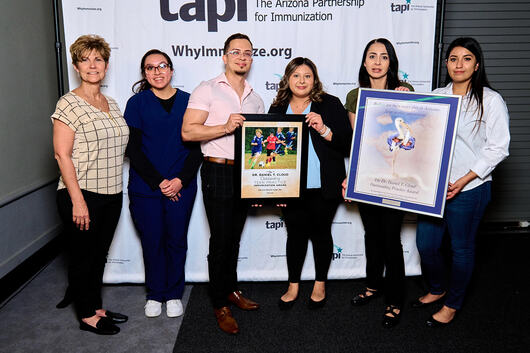 Ms. Yesenia Sedano, Quality Assurance Coordinator with RCBH/SLWIC (fourth from left to right) receives the TAPI Award